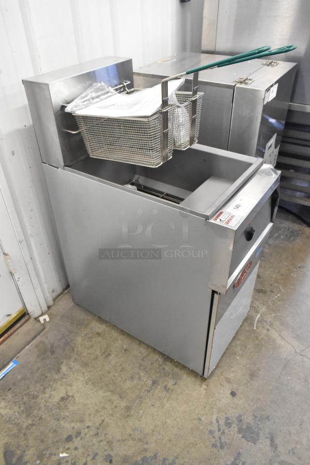 Brand new Avantco 177EF40D stainless steel commercial fryer with scratch and dent. Includes two metal fry baskets.