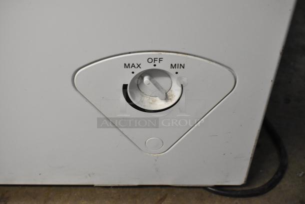 Arctic King ARC070S0ARWW chest freezer. Visible temperature dial with MAX, OFF, MIN settings. 115V, 1 Phase.