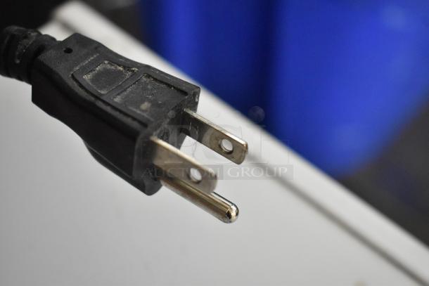 Close-up of a power plug for the Arctic King ARC070S0ARWW chest freezer, 115 Volts, 1 Phase.