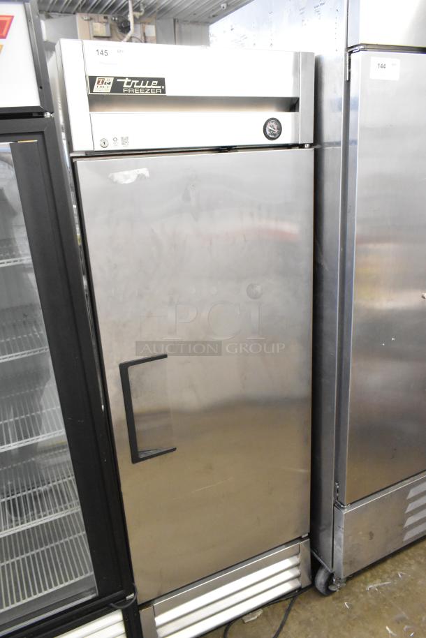 2016 True T-19F stainless steel single door commercial freezer, poly coated racks, 115V, 1 phase, visible True logo.
