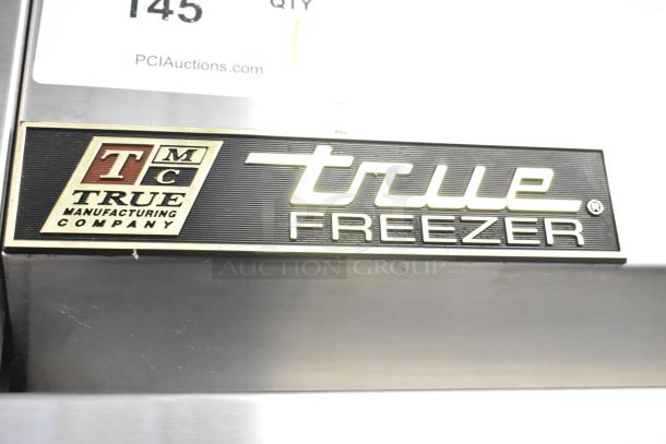 2016 True T-19F Stainless Steel Commercial Freezer, single door, with poly coated racks; labeled "True Freezer."