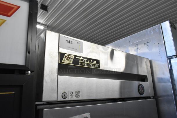 2016 True T-19F stainless steel single door reach-in freezer, with poly coated racks, 115 Volts, 1 phase.