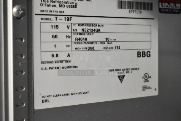 Label of 2016 True T-19F commercial freezer, showing model and electrical specs: 115V, 60Hz, 1 Phase, R404A refrigerant.