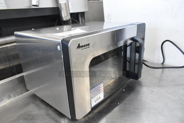 Amana RMS10DSA stainless steel commercial countertop microwave oven in original box, 120 volts, 1 phase, mint condition.
