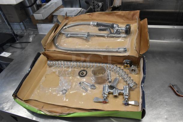 Brand new Regency 600PRD4X pre-rinse faucet, 1.15 GPM, deck-mounted, scratch and dent condition, includes installation components.