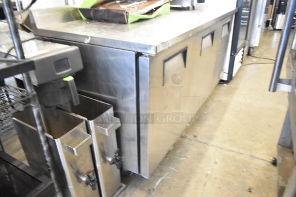 True TWT-72 stainless steel commercial 3-door undercounter cooler on casters, 115 volts, 1 phase. Used condition.