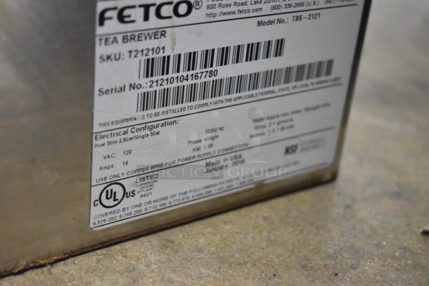 Fetco TBS-2121 iced tea machine, stainless steel, countertop model with 2 dispensers; label shows 120V, 1 phase, UL listed.