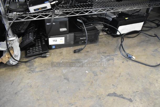 Lot with Star TSP100 Receipt Printer, 4 keyboards, computer tower, and APC UPS. Good condition, auction tag 152 visible.