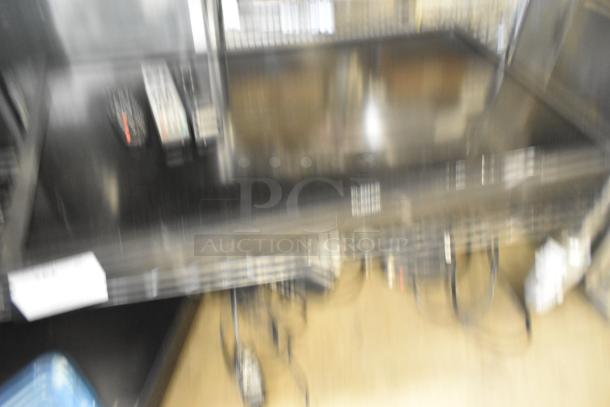 Blurry image of a Planar television with visible cables. Buyer must dismantle. Freight charges apply.