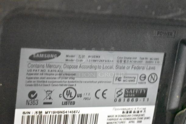 A Samsung 943SWX monitor label displaying model number LS19MYZKFV/ZA. Contains mercury warning, UL listed.
