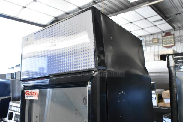BRAND NEW Galaxy 177GDN5RBB metal commercial single door cooler, scratch and dent, with LED lighting, door issue.