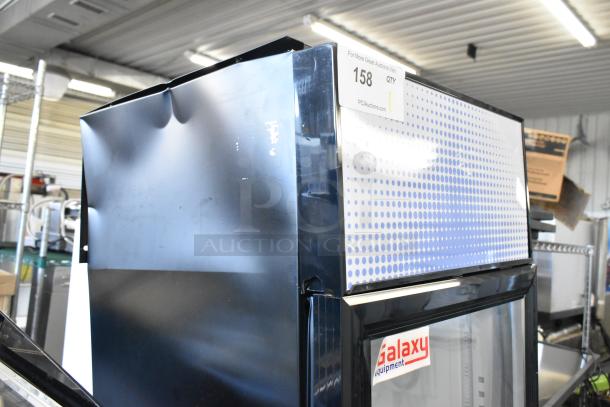 BRAND NEW Galaxy 177GDN5RBB metal commercial single door cooler with red, white, blue LED lighting. Door doesn't stay closed.