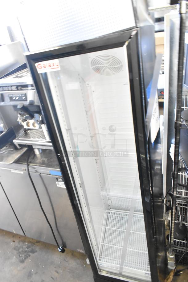 Brand new Galaxy 177GDN5RBB single-door cooler with red, white, blue LED lighting. Scratch and dent; door issues. 110-120V.