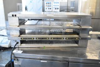 Savory Merco MHCFA34 stainless steel commercial holding bin with two-tier shelves, 208 volts, 1 phase, visible controls.