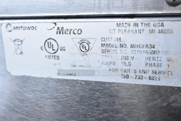 Merco MHCFA34 stainless steel holding bin label showing model, serial number, 208V, 1 phase, 15A, UL listed.