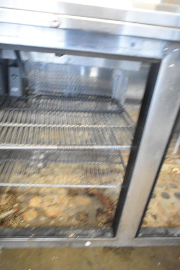 Perlick BR48 stainless steel commercial 2-door undercounter cooler, visible interior shelving, 115 volts, 1 phase.