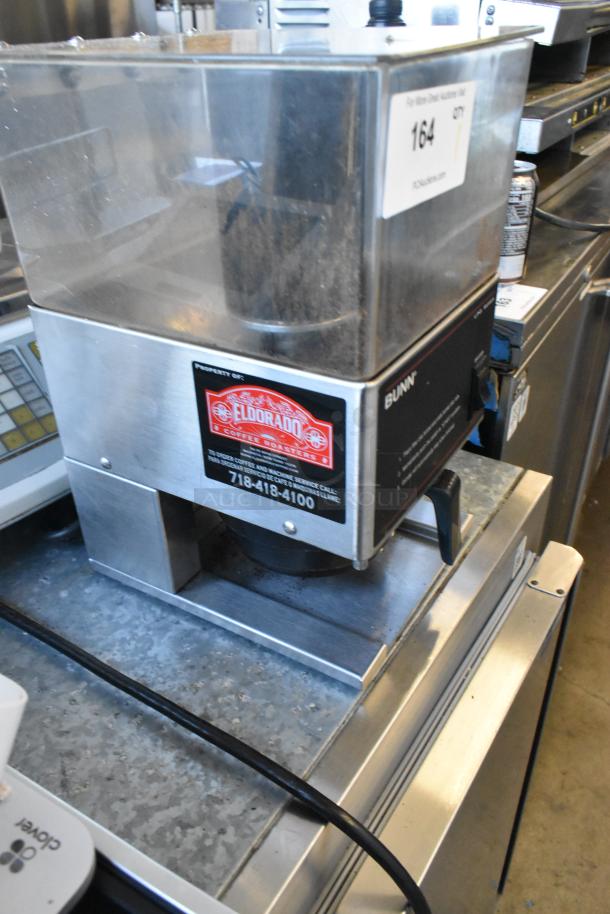 Bunn Metal Commercial Coffee Bean Grinder, 120 Volts, 1 Phase. Features front logo, industrial design, used condition.