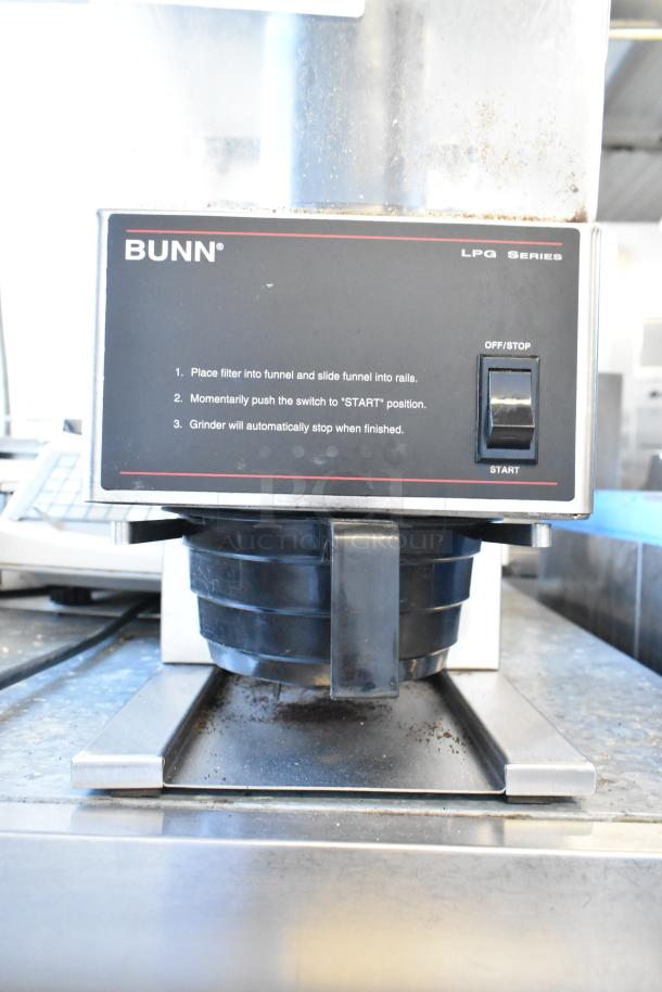 Bunn Metal Commercial Coffee Bean Grinder, model LPG Series, 120 Volts, 1 Phase, with start/stop switch and usage instructions.