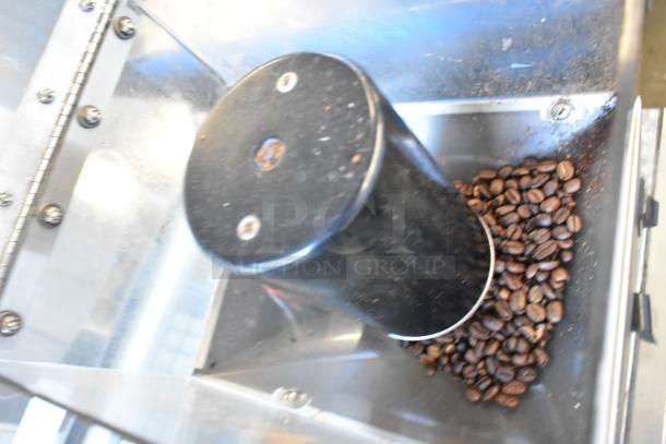 Bunn Metal Commercial Countertop Coffee Bean Grinder with visible beans, 120 Volts, 1 Phase.