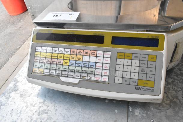 Easy Weigh LS-100 metal countertop scale, keypad interface, 240 volts, 1 phase, in good condition with visible model label.