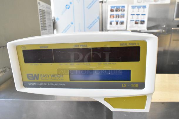 Easy Weigh LS-100 metal countertop scale, 240V, 1 Phase, digital display, minor wear, ideal for retail settings.
