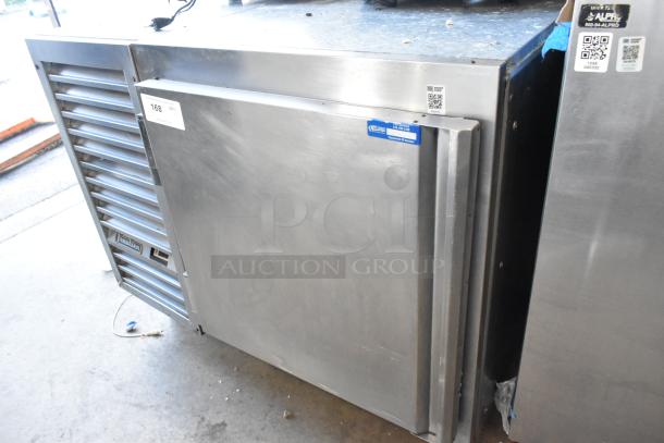 Traulsen stainless steel single door undercounter blast chiller in good condition, with label indicating model details and capacity.
