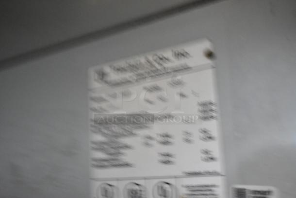 Traulsen stainless steel single door undercounter blast chiller with labeling, indicating model and specifications.