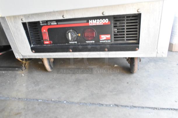 Metro C199 Heated Holding Cabinet, metal, on commercial casters, 125 volts, 1 phase, with HM2000 holding module.
