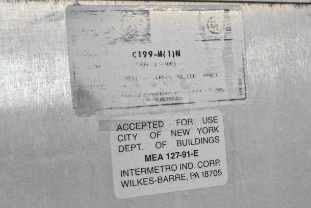 Metro C199 Flavor Hold holding cabinet label, showing 125 volts, 1 phase, accepted by NYC Dept. of Buildings.