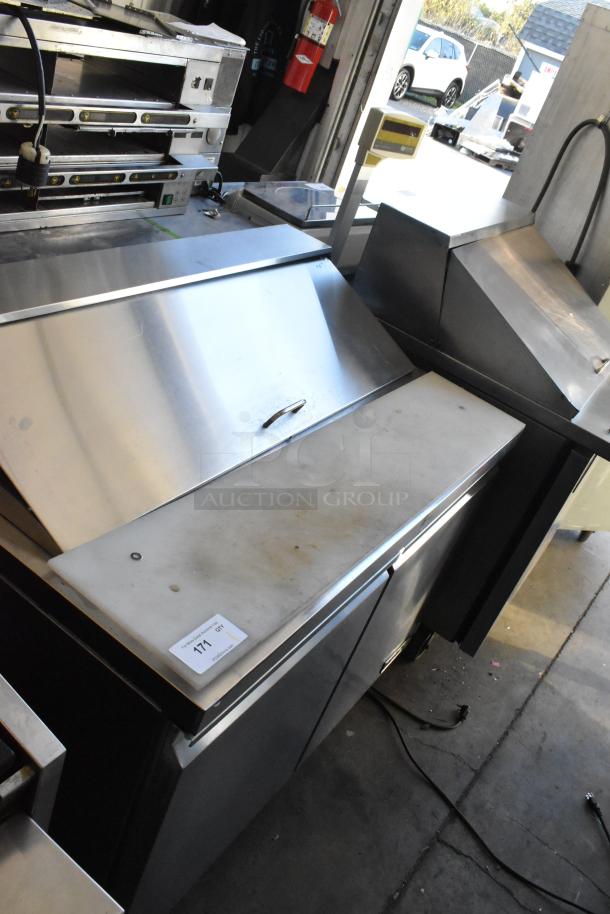 Motak MST-48-X stainless steel commercial sandwich prep table with Bain Marie top, on casters. Model label visible.