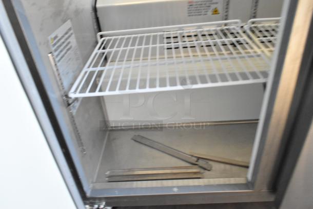 Motak MST-48-X stainless steel sandwich prep table, interior view with shelves; 115V, 1 phase; on commercial casters.