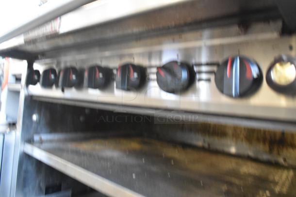 MagiKitch'n 636 stainless steel commercial charbroiler grill, natural gas, features control knobs, under shelf, good condition.