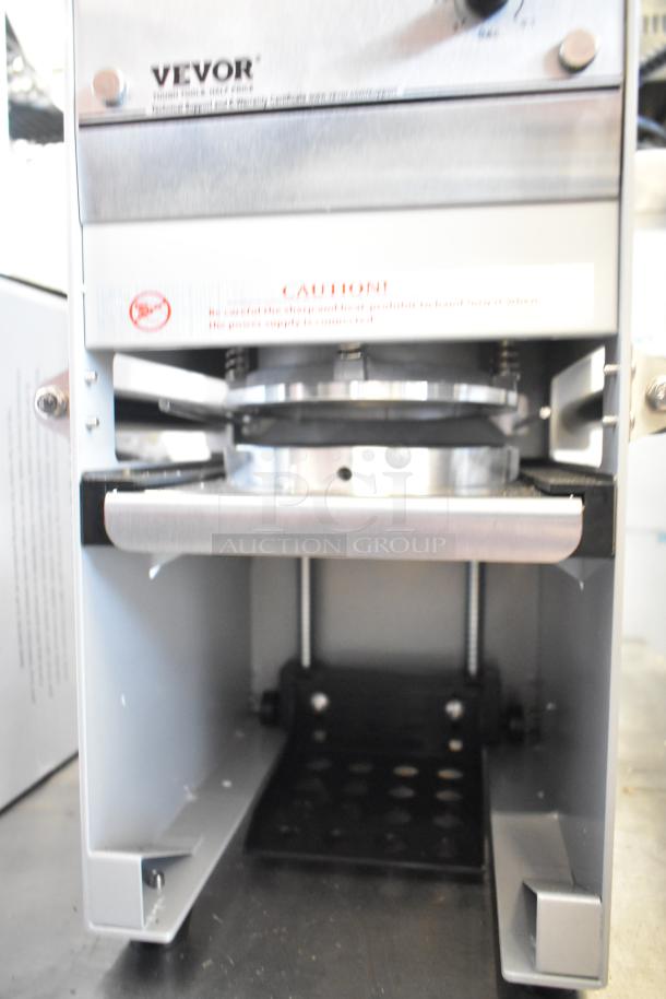 Vevor WY-680 stainless steel semi-automatic bubble tea cup sealing machine, 120 volts, front view, brand label visible.