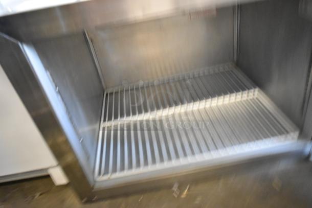Silver King SKSF/C1 stainless steel commercial single door freezer, 115 volts, open interior view with wire shelving.
