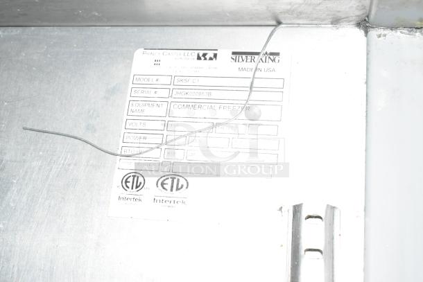 Silver King SKSF/C1 stainless steel commercial freezer label, showing model, serial number JHGK000953B, 115 volts.
