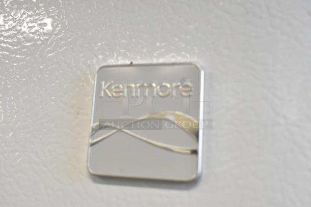 Kenmore metal single door reach-in freezer badge, showcasing brand logo, textured white finish, 115 volts, 1 phase.