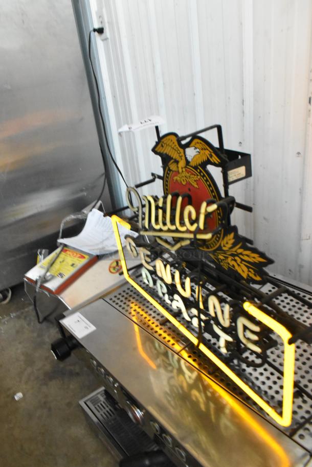 Miller Genuine Draft neon light up sign with eagle logo, in good condition. Local pickup required.