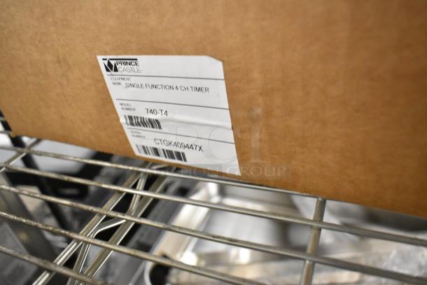 Prince Castle Single Function 4 Channel Timer in box, model 740-T4, label shows serial CTGK409447X on metal shelf.