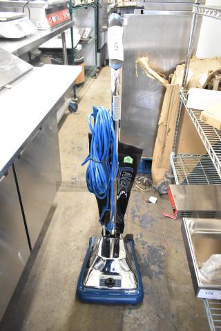 BRAND NEW Lavex 12" Upright Vacuum, HEPA filter, 457LAVHEPA12 model, blue cord, scratch and dent, 120V.