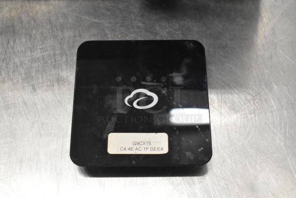 Black Cloudcover G9CX device with cloud logo and label showing "G9CX15" on a metal surface.