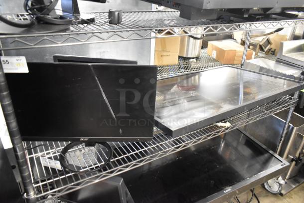 Three computer monitors: Lenovo, Dell, and Acer, on metal shelving. Various sizes. Buyer pickup only; no shipping available.