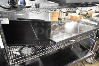 Three computer monitors: Lenovo, Dell, and Acer, on metal shelving. Various sizes. Buyer pickup only; no shipping available.