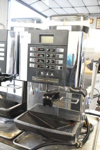 Faema X1 Grand Italia stainless steel automatic espresso machine with steam wand, commercial countertop model, well-maintained.