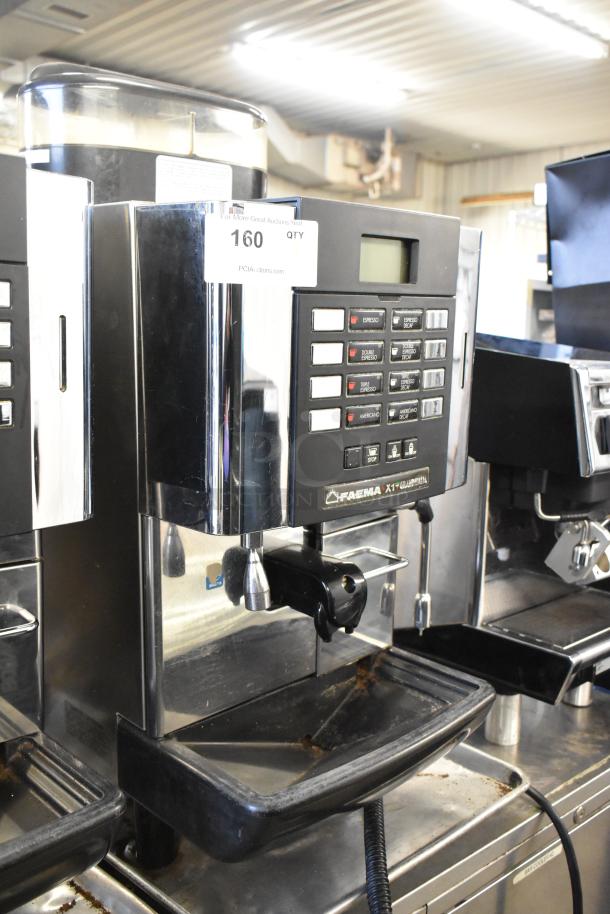 Faema X1 Grand Italia stainless steel automatic espresso machine with steam wand, countertop model, digital display, used condition.