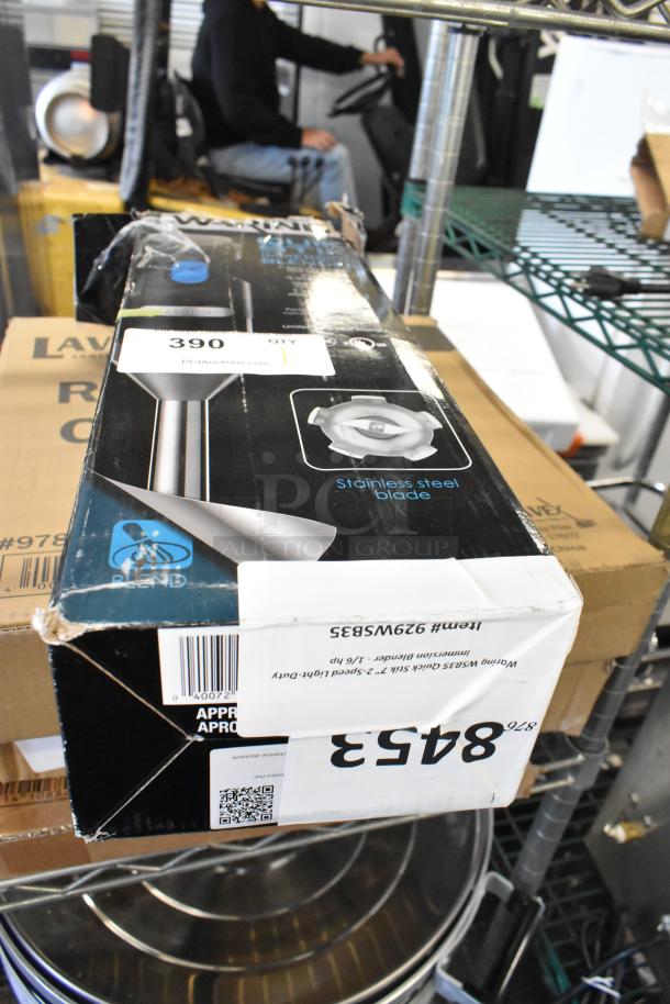 Brand new Waring WSB35 immersion blender box, 7" 2-speed, 1/6 hp, labeled "Stainless steel blade," showing signs of wear.