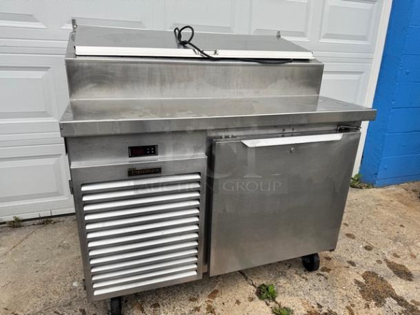 Traulsen 48" pizza prep table, model TS048HT, on casters, stainless steel, 115V, digital display, tested and working.