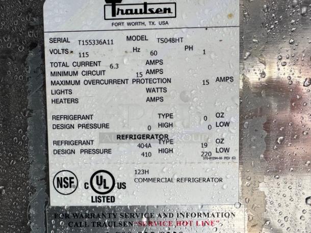 Traulsen 48" pizza prep table on casters, model TS048HT, 115V, tested and working, NSF and UL listed, serial T155336A11.