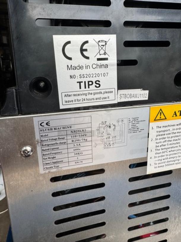 VEVOR Slushy Machine, model XRJ3LX2, features 3Lx2 tanks, tested & working, 110V, with labels indicating specs and origin.