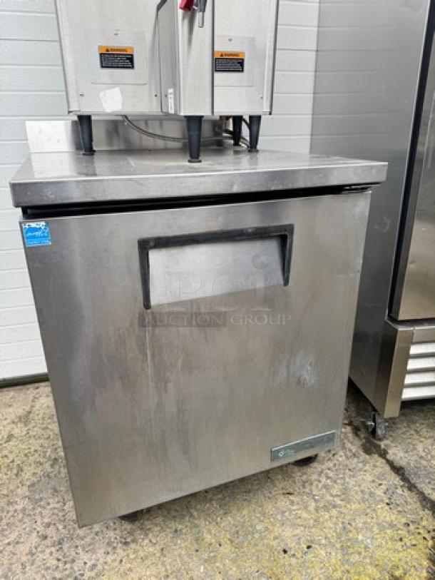 TRUE TWT-27-HC single door undercounter refrigerator on casters. Tested and working, 115V. Stainless steel, good condition.