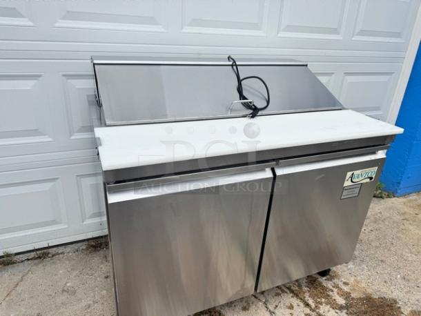 AVANTCO 2 Door Sandwich Table on casters, Model 178SCL2. Stainless steel, 115V, tested and working condition.